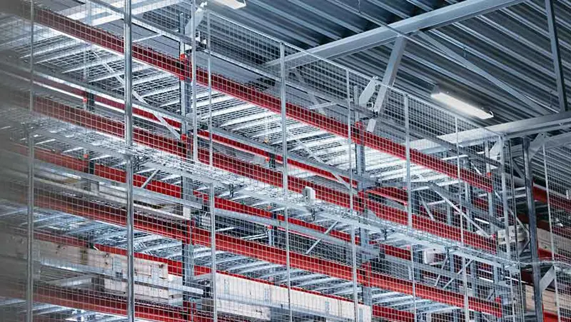 Mesh panles used in a warehouse to keep goods from falling to the ground