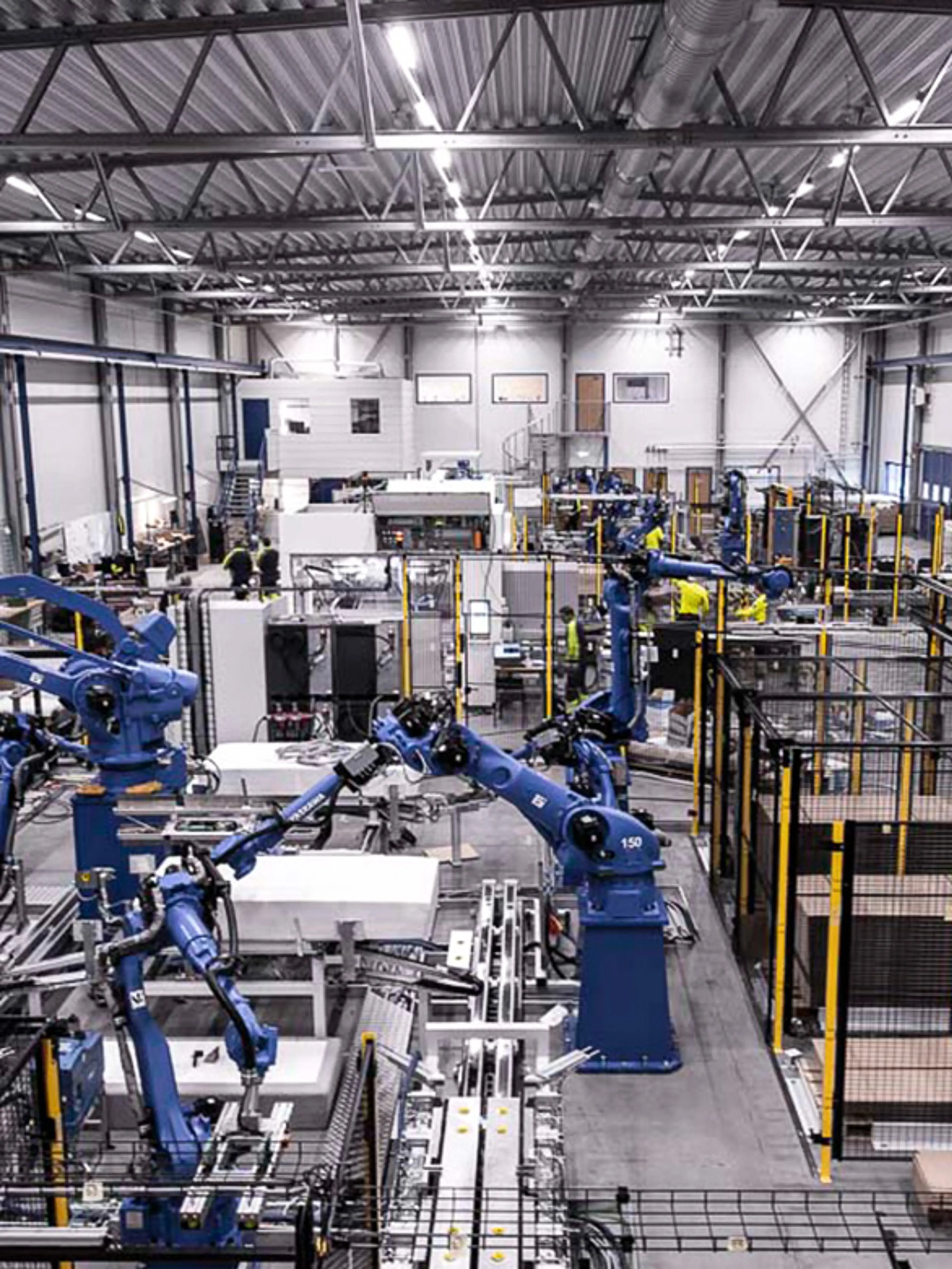 Fasta automationsmaskiner med skyddade in- och utgångspunkter för att minska risker från rörliga varor